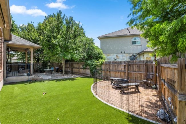 View of yard featuring a gravel patio | Image 30