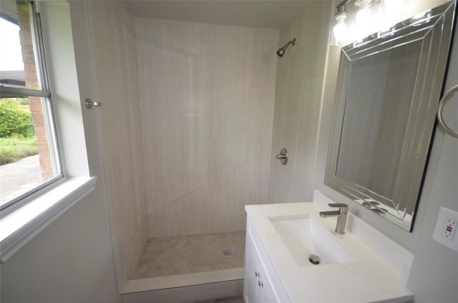 Gorgeously tiled walk-in shower in the owner's retreat | Image 21