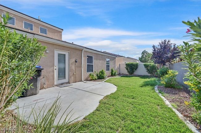 Fenced backyard featuring a patio area | Image 22