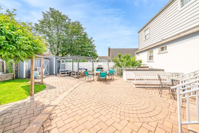 View of patio / terrace with outdoor dining area and an outdoor structure | Image 4