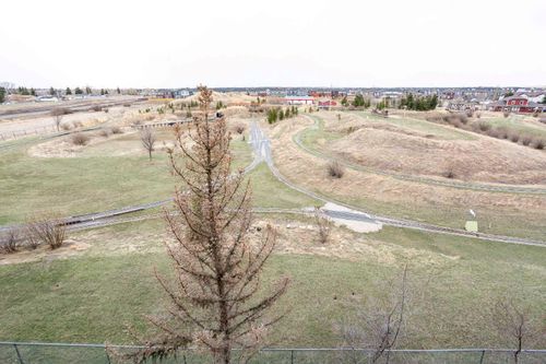 6405-304 Mackenzie Way Sw, Airdrie, AB, T4B3H6 | Card Image