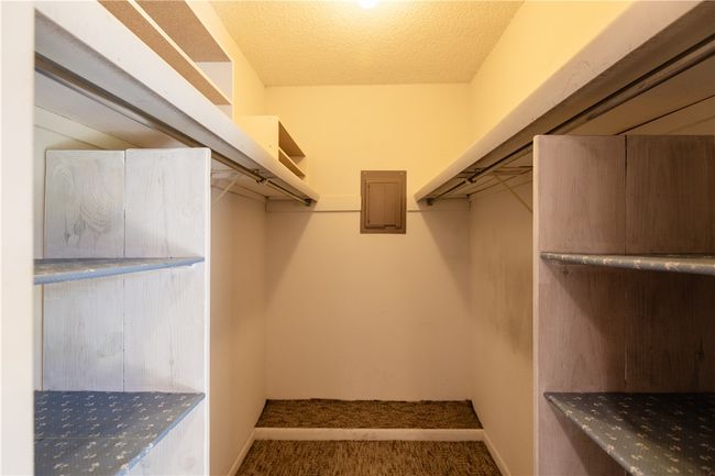 walk in closet in master bedroom | Image 29