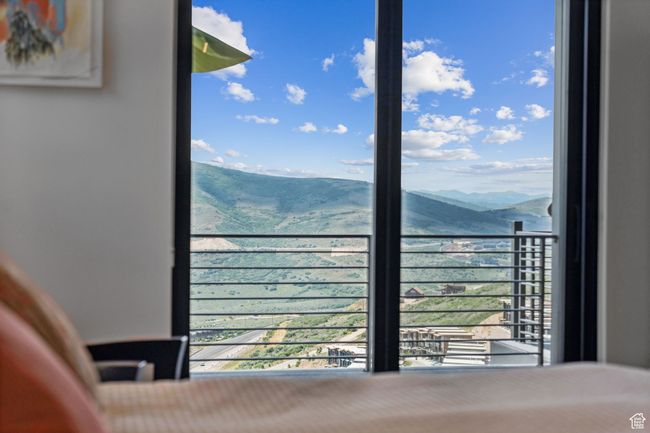 Bedroom featuring a mountain view | Image 74