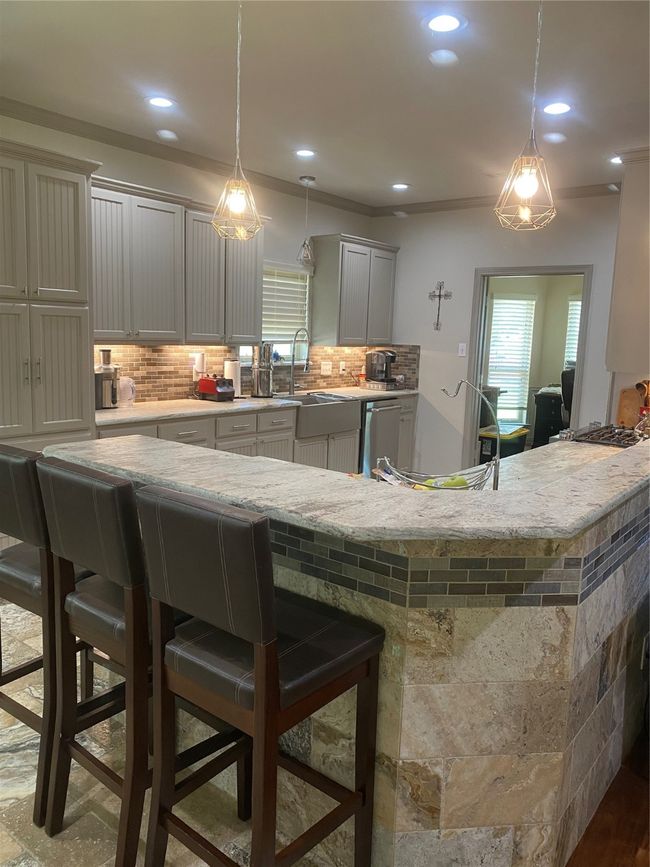 Open kitchen with plenty of storage and high grade appliances | Image 5