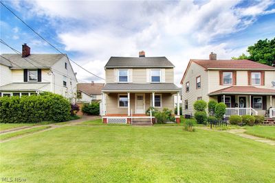 View of front of home with a porch and a front lawn | Image 3