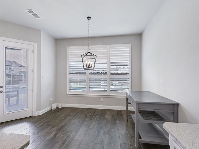View to the backyard patio and close to the outdoor kitchen for easy grilling! | Image 14