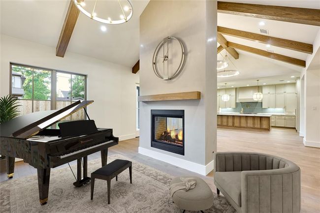 Another virtually staged image highlighting the den-like space and its versatility! | Image 12