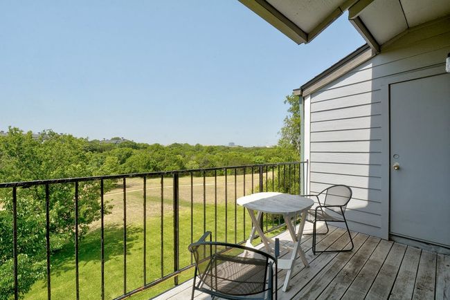 Very private patio with storage shed and wide open view of the greenbelt. | Image 22