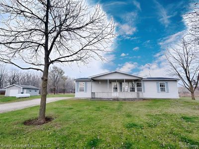 14118 Koehn Road, Home with 3 bedrooms, 2 bathrooms and null parking in Mussey Twp MI | Image 2