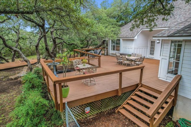 Thoughtful landscaping and trenching around the oak trees help preserve their long-term health. | Image 30