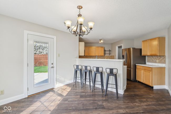 Love to entertain and yet able to keep the kitchen intimate, this is just your home. | Image 21