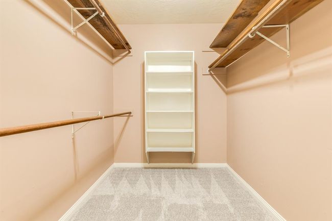 Large primary walk-in closet | Image 23