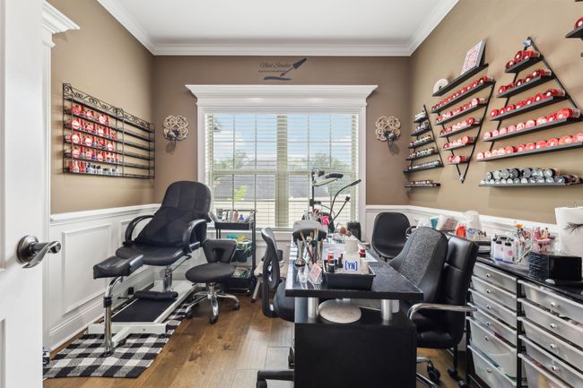 This office space features a massive window for abundant natural light and wainscotting for an artistic touch. This could make a great formal dining space as well! 1107 Sycamore Leaf Way Murfreesboro, TN 37129 | Image 14