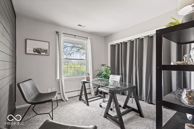 carpeted office space featuring baseboards | Image 30