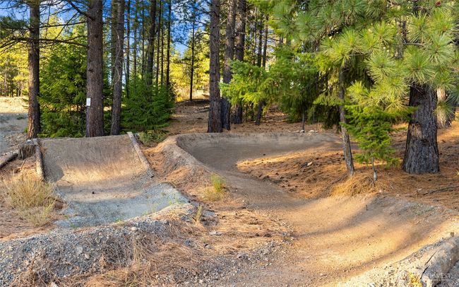 As the newest PNW master-planned community, enjoy 200+ acres of open space, trails & the Coal Trax Mt Bike Park. Soaring ceilings in the great roommake each day worthy of celebration & open floorplan appeals to entertaining. Covered deck & patio. Southern-facing homesites range from the mid600s- 900ks. Enjoy a variety of innovative & distinctive new home options with the best all-season recreation just moments away! Built for the future, indulge in a retreat just 90-min to Seattle. Plans and elevations are artist’s renderings only, may not accurately represent the actual condition of a home asconstructed and may also contain options and upgrades which are not included in the sale. Trailside Homes reserves the right to make changes to the floorplan, specifications, dimensions, design and elevations without prior notice. Stated dimensions and square footage are estimated and should not be usedas representations of the home’s actual size. | Image 31