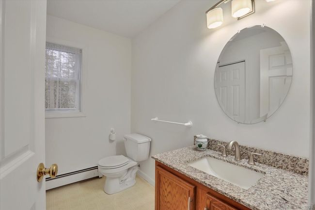 Large first floor bathroom, granite topped vanity, with 2 linen/pantry closets. | Image 13
