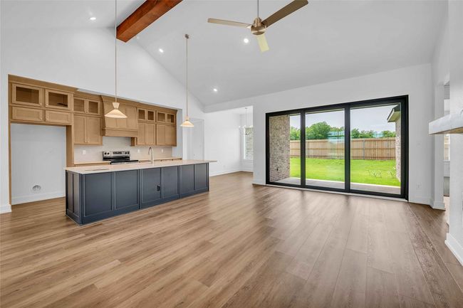 Please Note: These interior photos are not of the actual design, but are of a completed design with a similar floor plan. Finishes, features, and layouts may vary. | Image 7