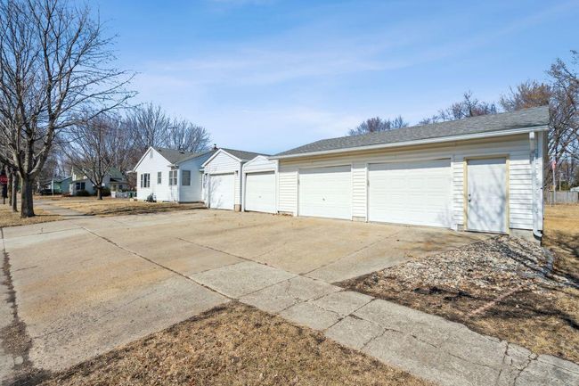 Look at this! 4 stall ATTACHED garage! | Image 4