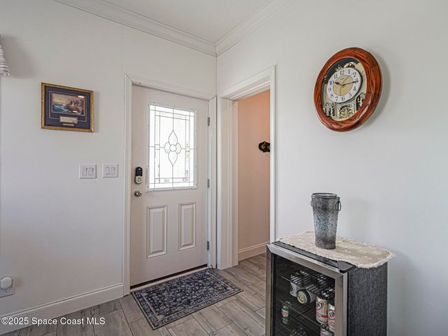 623 Hyacinth Cir, House other with 3 bedrooms, 2 bathrooms and null parking in Barefoot Bay FL | Image 11