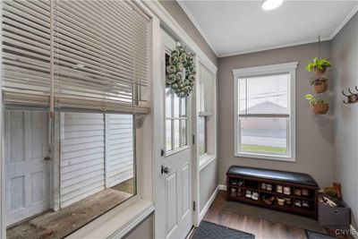 Coming into the foyer/mud room, enjoy this space to keep the main house tidy and leave your shoes and coats here. Foyer was rebuilt from the studs, with new joists & insulation to new flooring and lighting, etc. | Image 3