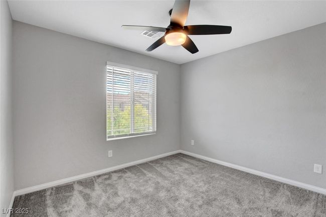 Carpeted spare room with ceiling fan and baseboards | Image 30