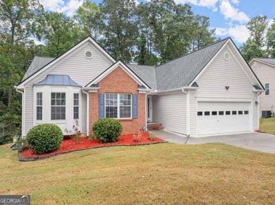 2979 Merrion Park Lane, House other with 7 bedrooms, 3 bathrooms and 2 parking in Dacula GA | Image 2