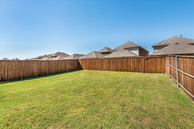 View of yard with a fenced backyard | Image 35