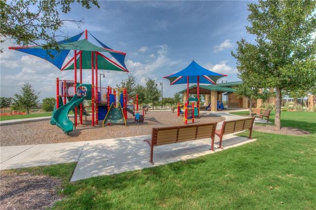 Community playground with a lawn | Image 13