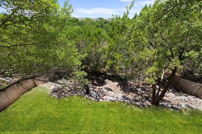 Perched above the trees with a clear view of the greenbelt, the balcony feels like your own hidden lookout. *Virtual green grass | Image 21
