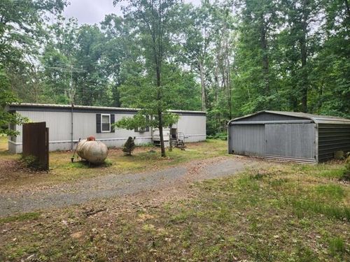 1387 N Timberwolf Trl, Baldwin, MI, 49304-8689 | Card Image