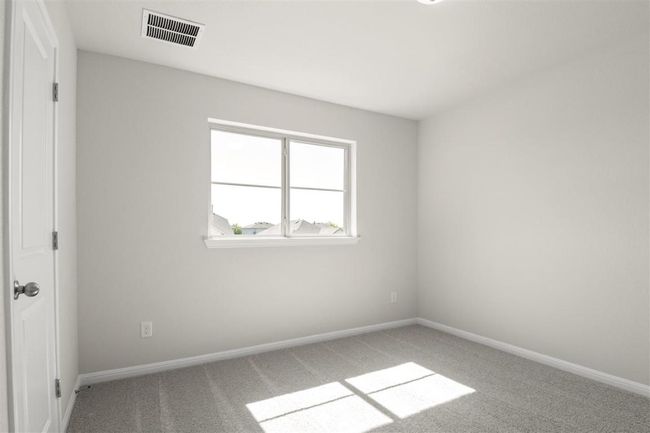 Carpeted empty room with baseboards and visible vents | Image 25