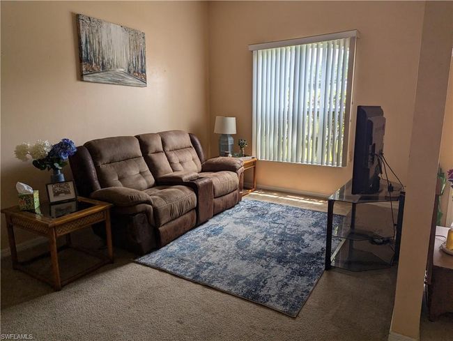 View of carpeted living area | Image 6