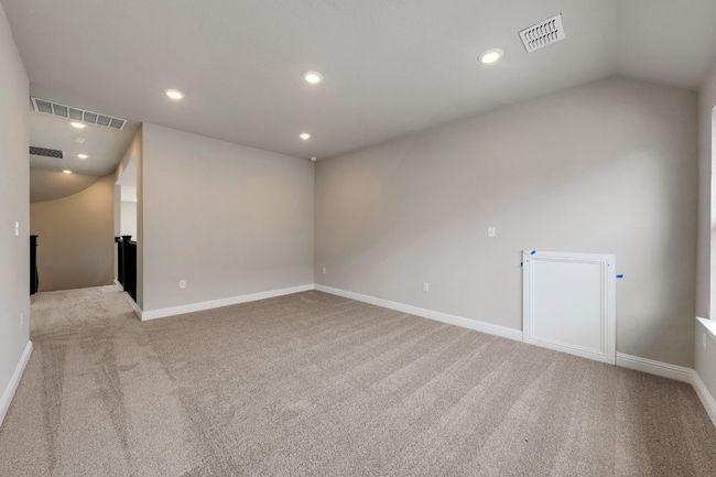 Carpeted spare room with recessed lighting and vaulted ceiling | Image 14