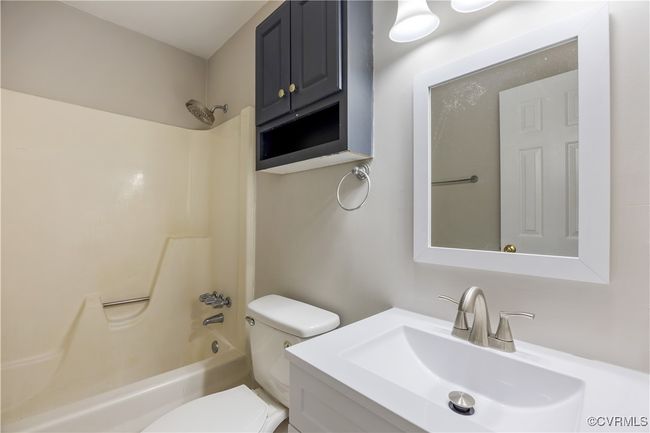 First floor bathroom featuring shower / tub combination and vanity | Image 15