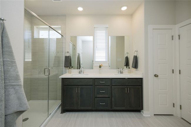 These photos showcase a previously finished Lea home. Please be aware that features, selections, and options may vary. For the most current information, contact your RNL Sales Executive to obtain the latest selections book and floorplan, which outlines the structural options available for this home. | Image 10