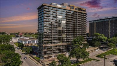 View of outdoor building at dusk | Image 1