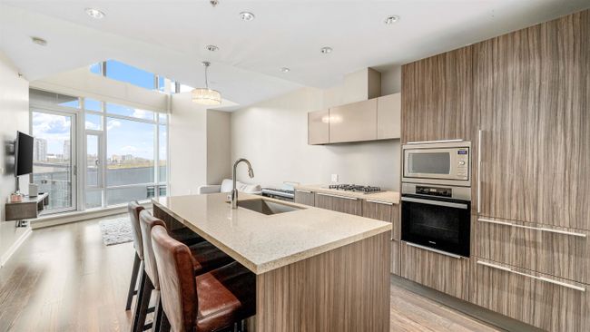 502 - 12 Athletes Way, Condo with 2 bedrooms, 2 bathrooms and 1 parking in Vancouver BC | Image 3