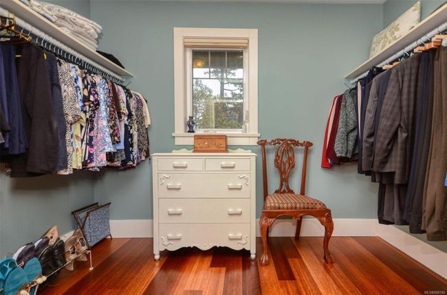 Spacious closet featuring hardwood floors | Image 15