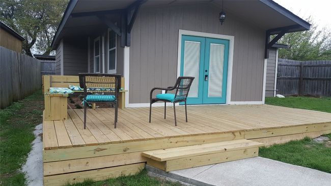 Deck featuring a fenced backyard | Image 25