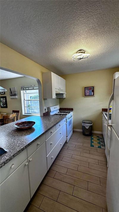 5 - 5071 Village Gardens Drive, Condo with 2 bedrooms, 2 bathrooms and null parking in Sarasota FL | Image 2