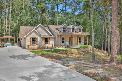 This home is situated on two spacious lots totaling 0.66 acres | Image 2