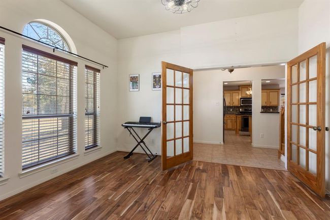 Notice the wood flooring and natural light. | Image 7