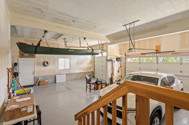 Garage featuring a garage door opener | Image 43