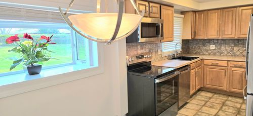 1607 Warwick Ln, Schaumburg, IL, 60193-1121 | Card Image