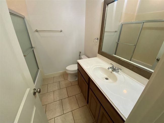 2nd bathroom accessible for guests with direct access to 2nd bedroom | Image 34