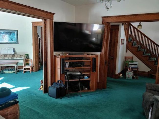 Living room with the pocket doors open | Image 45