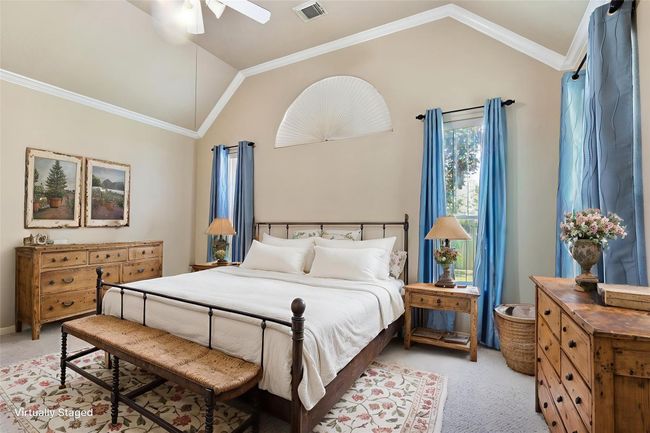 The primary bedroom is a lovely private retreat at the end of the day! | Image 21