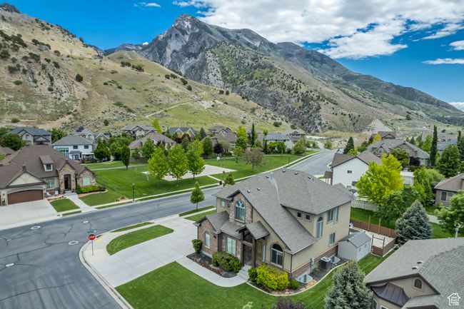 Aerial view of residential area featuring mountains | Image 43