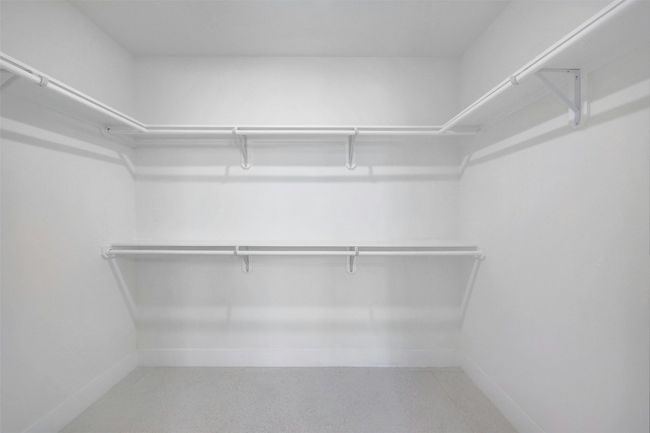 View of spacious closet | Image 15