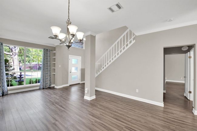 Formal dining area looking back towards front door and flexible space for office or your vision! | Image 5